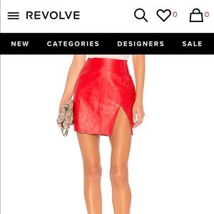 REVOLVE RED FAUX LEATHER MINI SKIRT - “TRINITY”